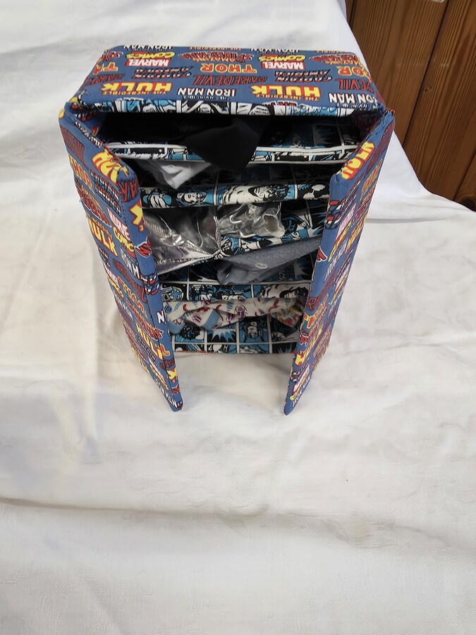 Bob's wardrobe by Evelyn.  Bob is a toy who has his own outfits and wardrobe all created by Evelyn